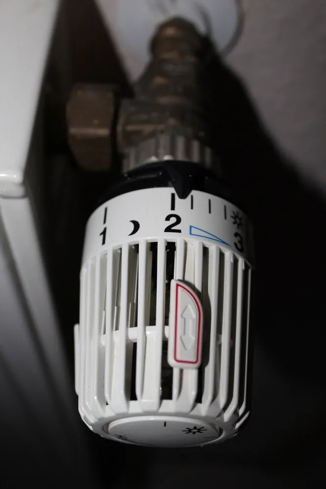 Close view of a numbered thermostatic valve dial